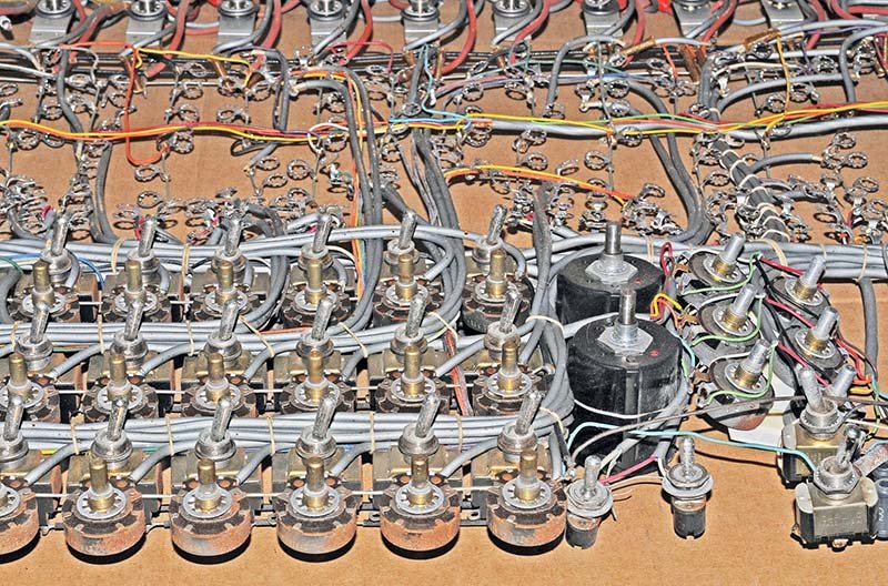 Rear of the ES-400 front panel showing the dense wiring harness connected to all 364 banana jacks — the harness is best removed as a single assembly